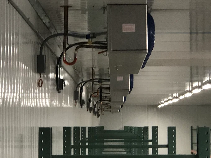 Evaporator unit installed on the ceiling of a cold room